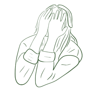anxious and depressed woman drawing with head in her hands